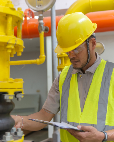 asian-engineer-wearing-glasses-working-boiler-roommaintenance-checking-technical-data-heating-system-equipmentthailand-people (1) 1