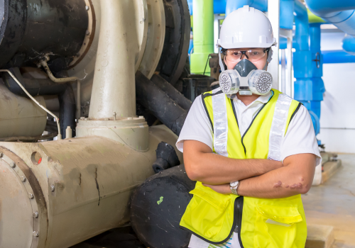 asian-engineer-wearing-glasses-working-boiler-roommaintenance-checking-technical-data-heating-system-equipmentthailand-people-wearing-gas-mask 1