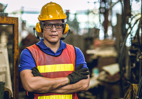 asian-professional-worker-standing-arm-cross-heavy-industry-working-factory-production-line-process-with-eyes-ears-safety 1