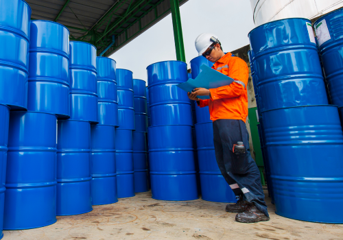 male-worker-inspection-record-drum-oil-stock-barrels-blue-horizontal-chemical-industry 1